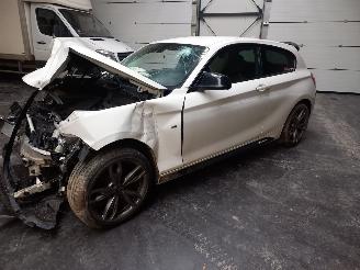 skadebil auto BMW 1-serie 116 2013/1